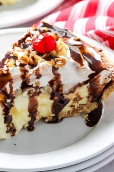 A slice of banana split pie on a plate.