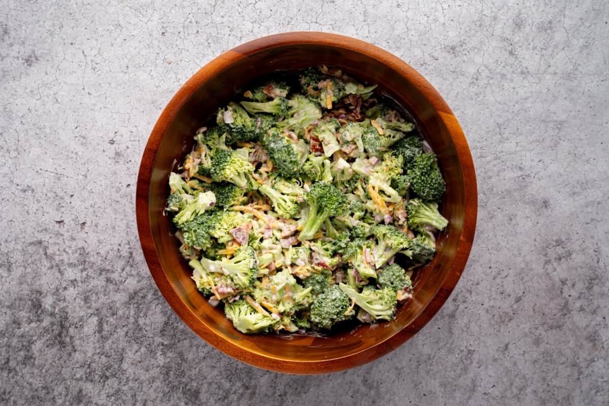 Broccoli salad in wooden bowl.