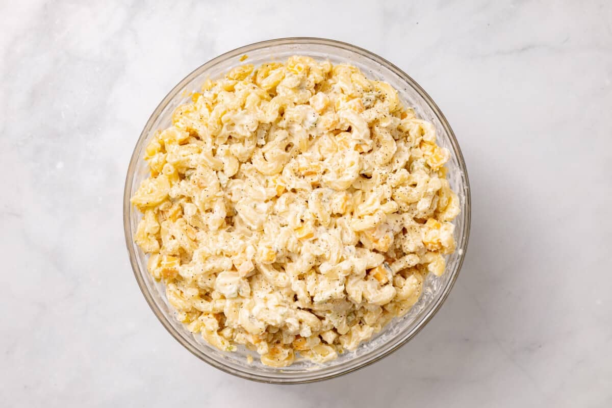 Macaroni pasta salad in glass bowl.