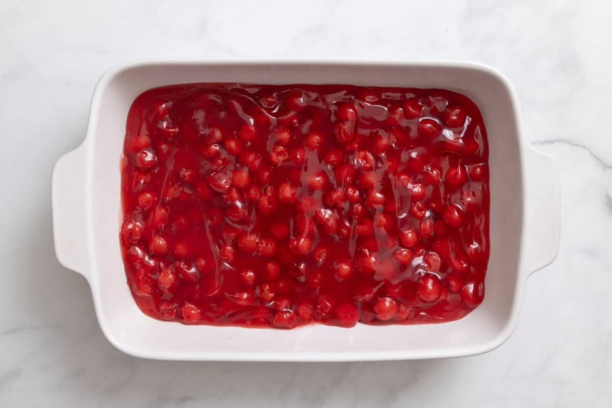 Cherry pie filling in pan.