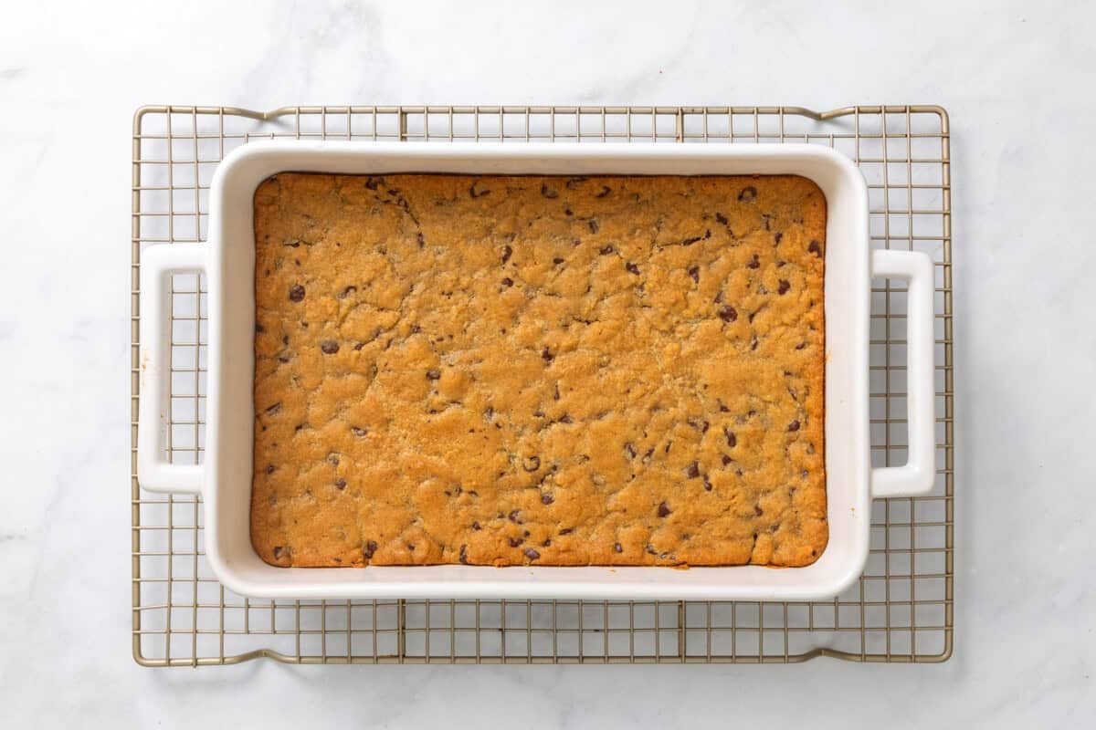 Chocolate chip cookie crust in pan.