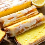 sliced lemon loaf bread recipe with glaze drizzled on top