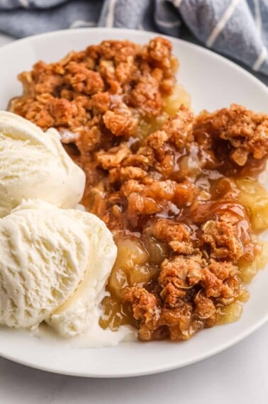 serving of apple crumble with ice cream