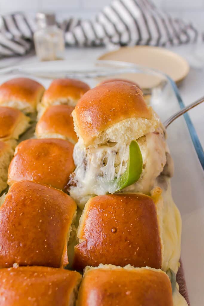 philly sliders in a dish on a table 