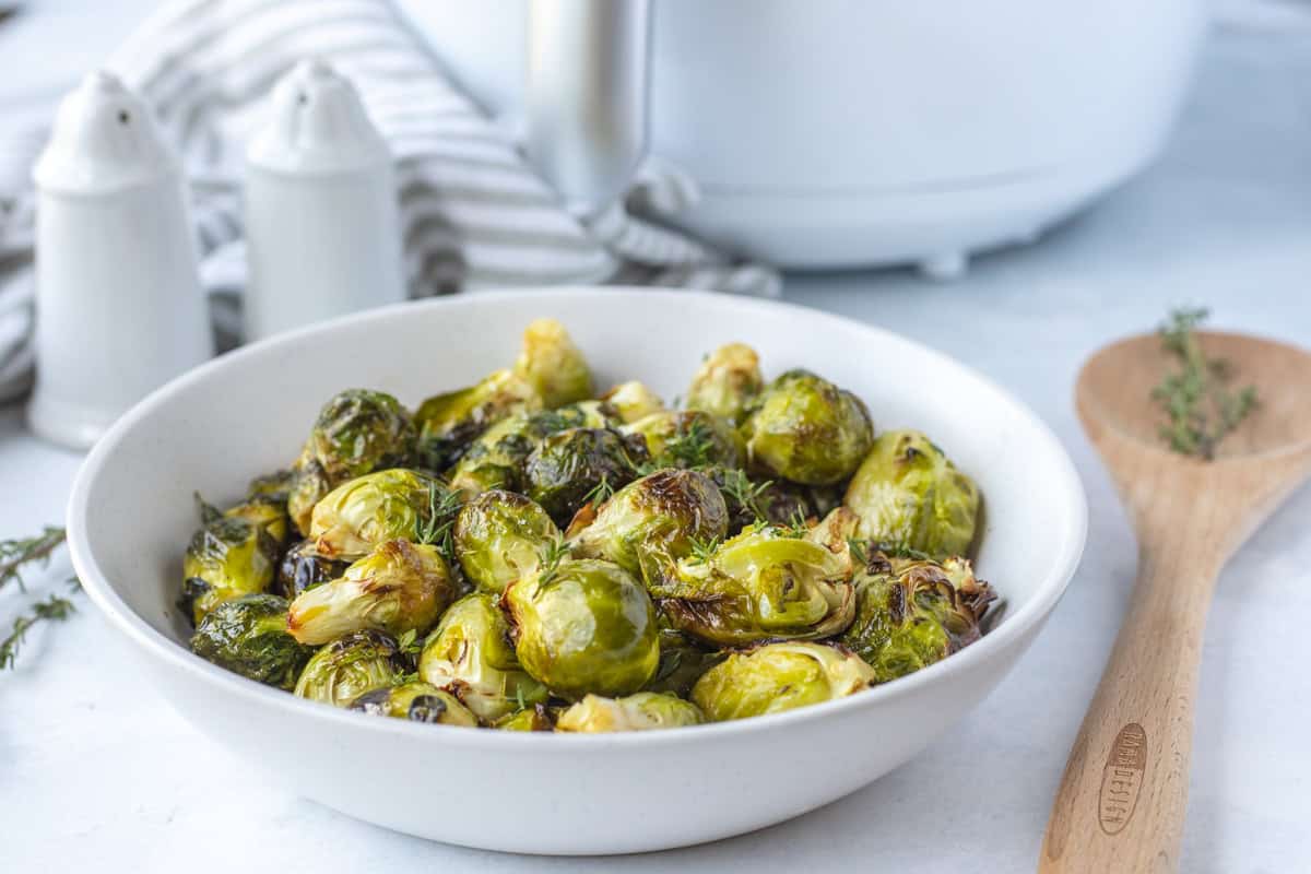 Air fryer brussels sprouts in bowl.