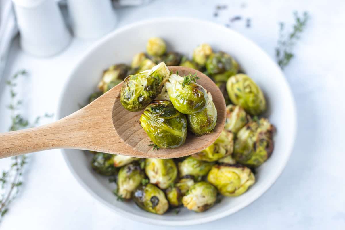 Spoonful of air fried brussels sprouts.