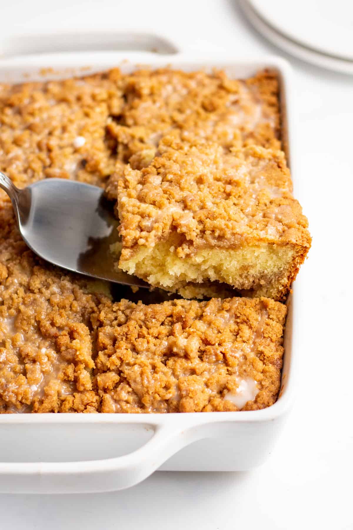 cake mix sour cream coffee cake baked in a casserole cake dish cut in squares