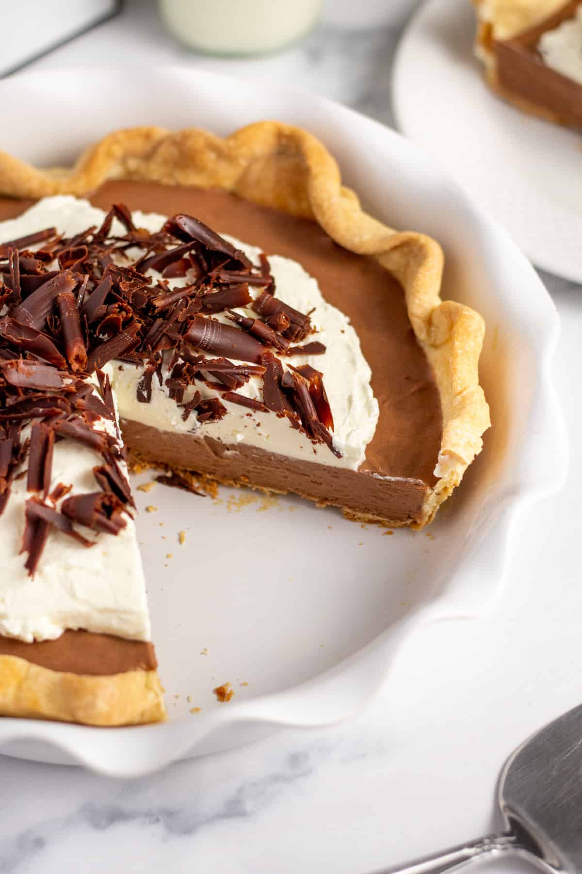 slice of french silk pie cut out of pie dish
