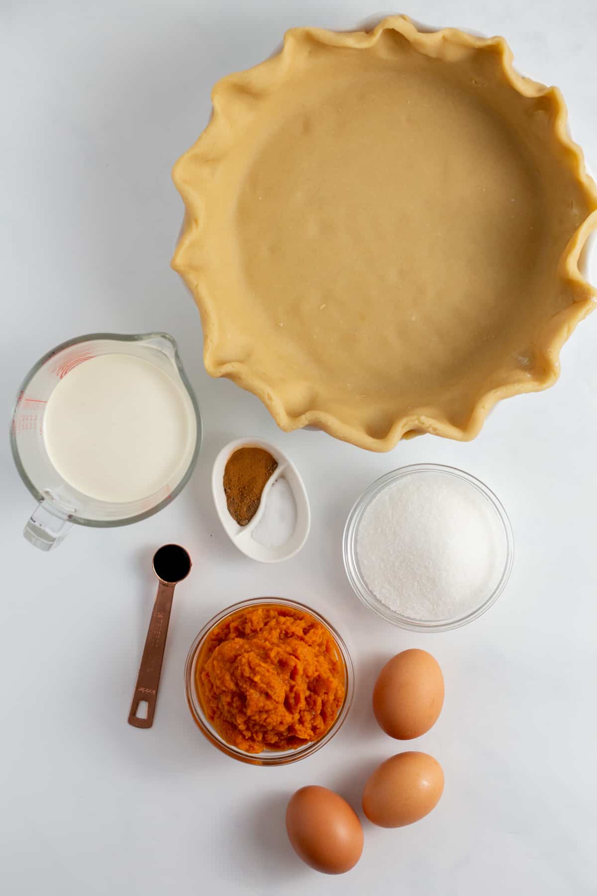 ingredients to make homemade pumpkin pie with a homemade crust
