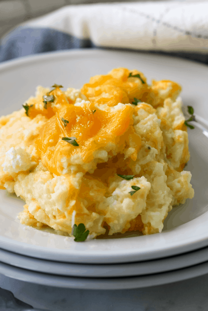 plate of cheesy hashbrown casserole 