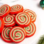 red white and green christmas pinwheel cookies on a plate