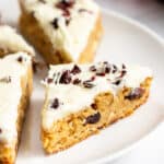 Homemade Cranberry Bliss Bars on a plate.