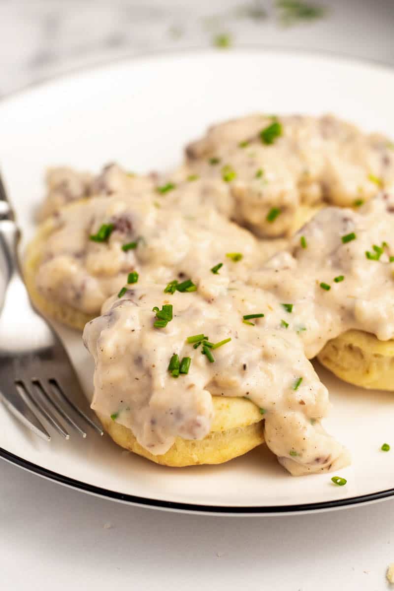 homemade biscuits and gravy served on a plate