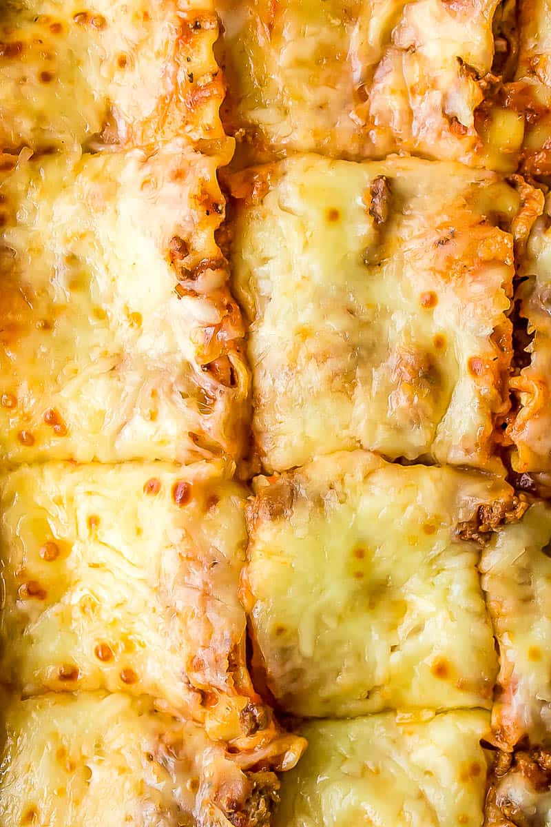 close up of baked and sliced easy meat and cheese lasagna