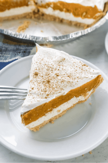 slice of no bake pumpkin pie on a white plate
