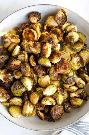 roasted brussel sprouts in a white bowl