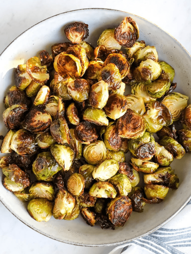 roasted brussel sprouts in a white bowl