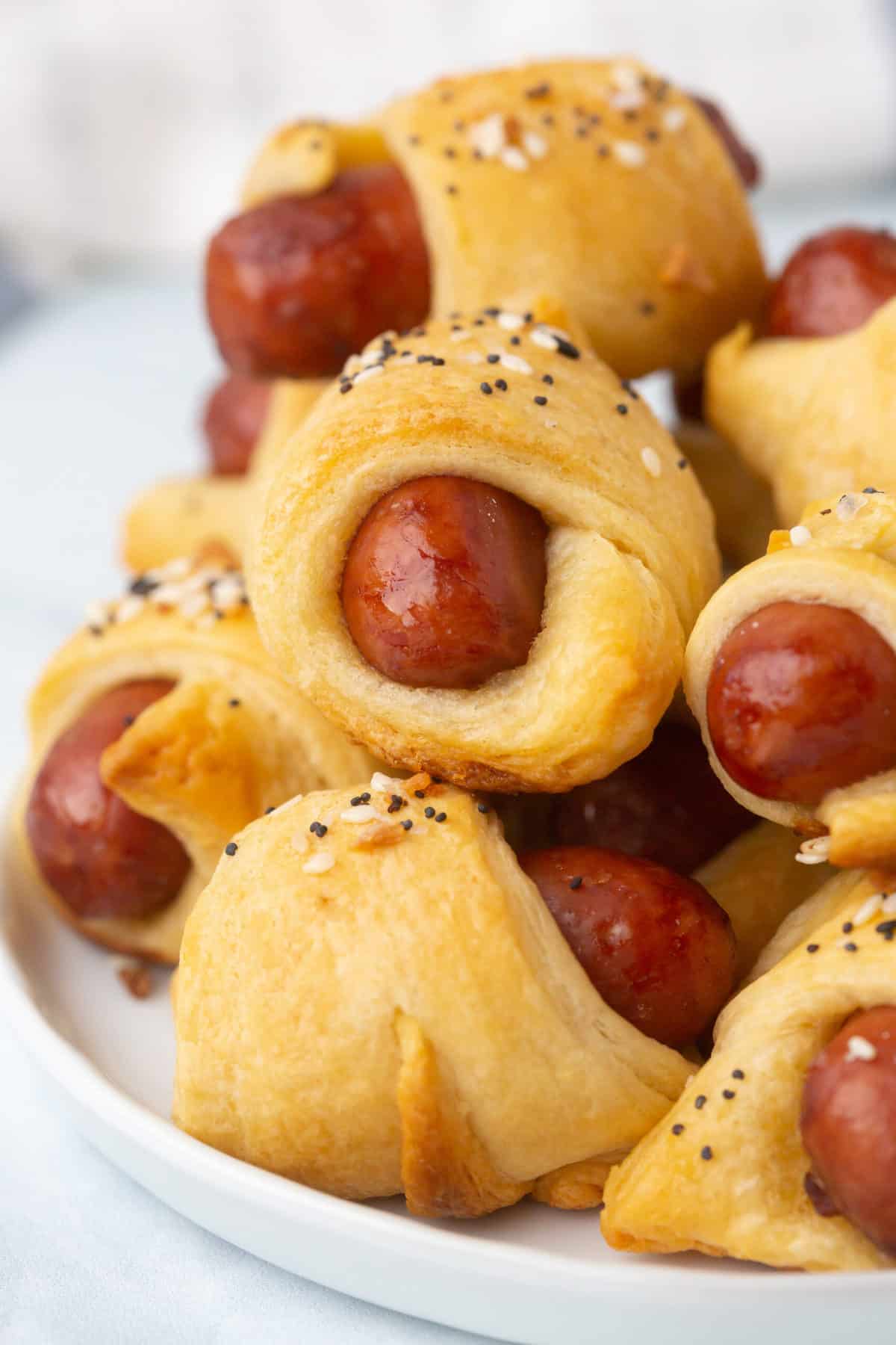 pigs in a blanket served on a plate
