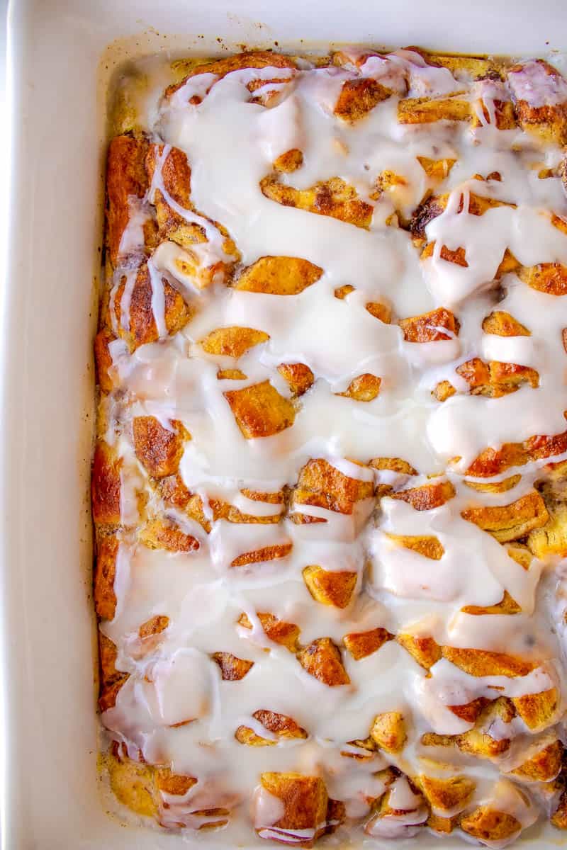 top down view of cinnamon roll french toast casserole with glaze.