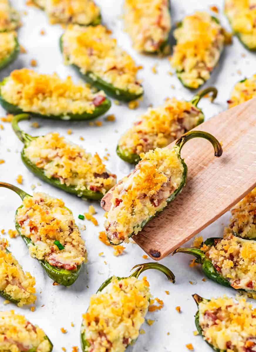 jalapeno popper on a wooden spoon