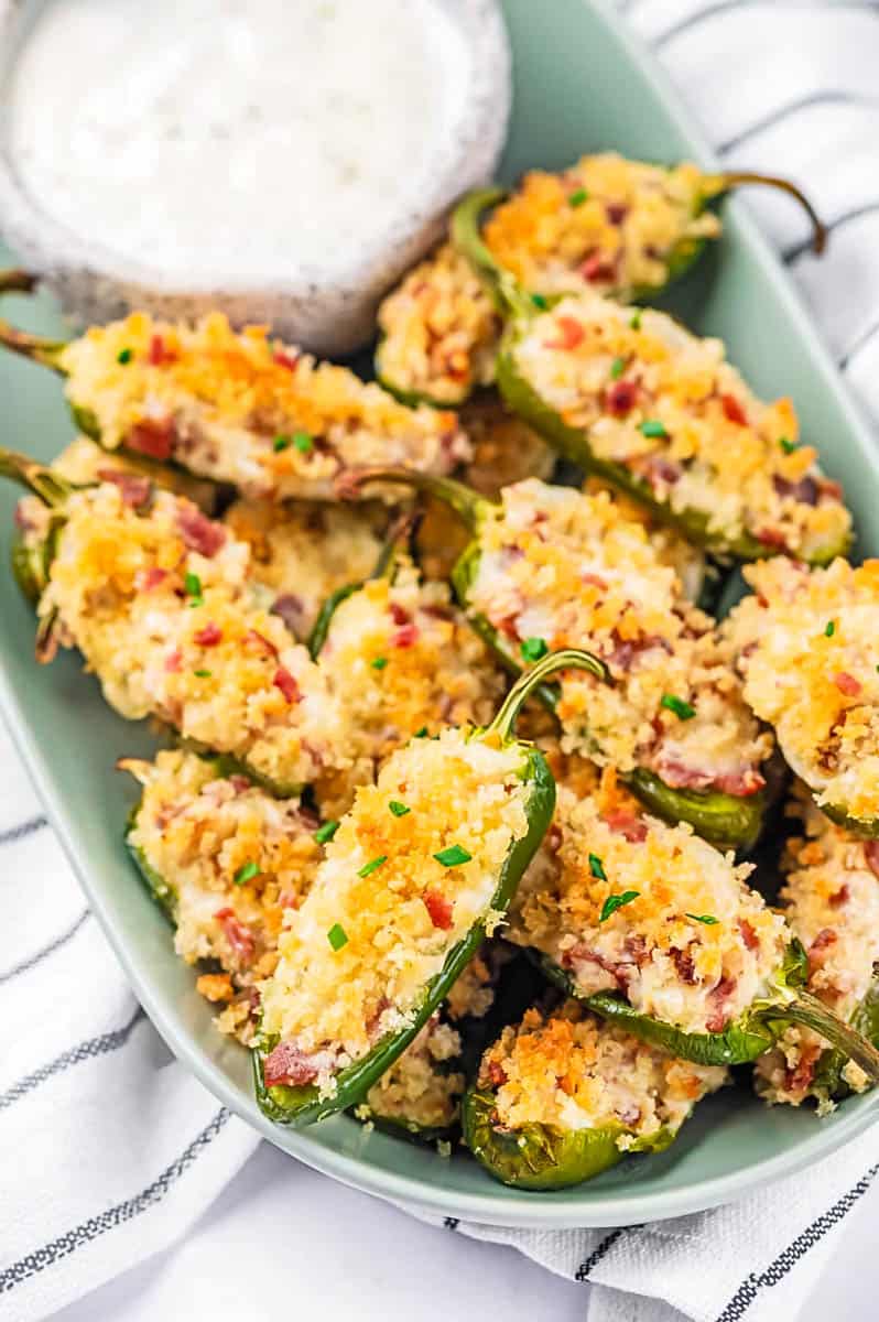 jalapeno poppers served in a green bowl
