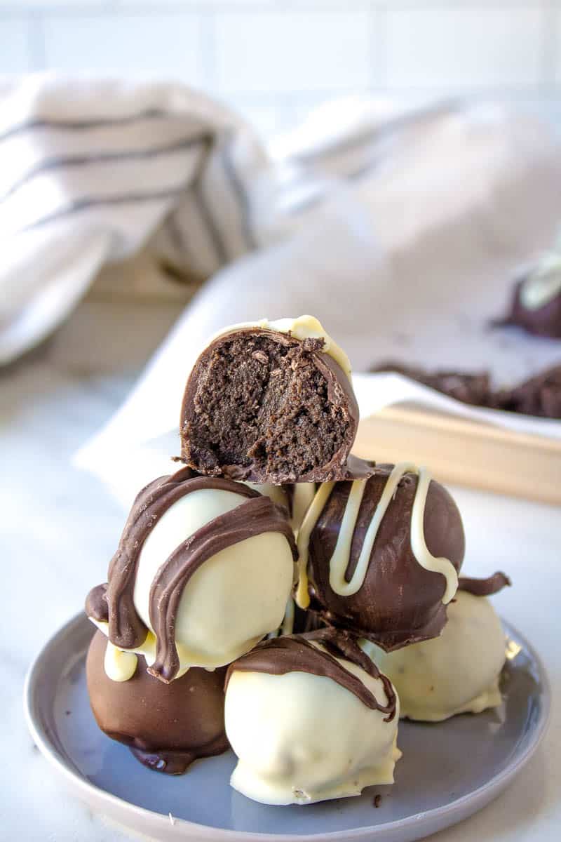 stacked oreo truffles on a plate