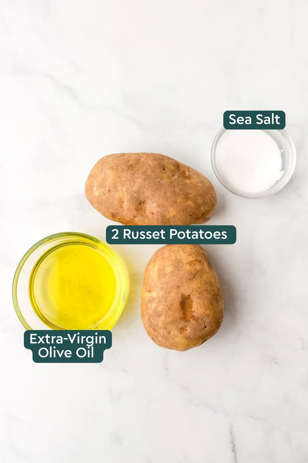 Ingredients for air fryer french fries, including potatoes, oil, and salt.