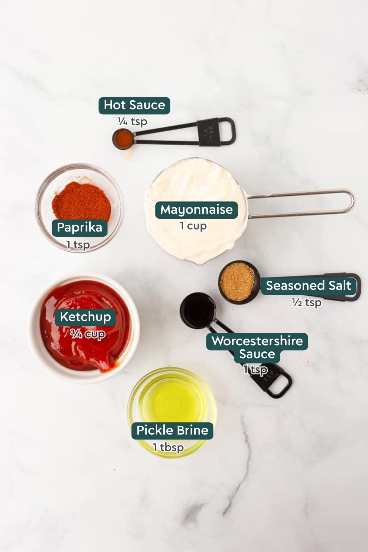 Ingredients for French fry dip, including hot sauce, paprika, mayo, ketchup, seasoned salt, worcestershire, and pickle brine.