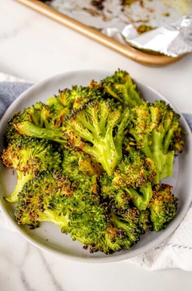 A bowl of roasted frozen broccoli.