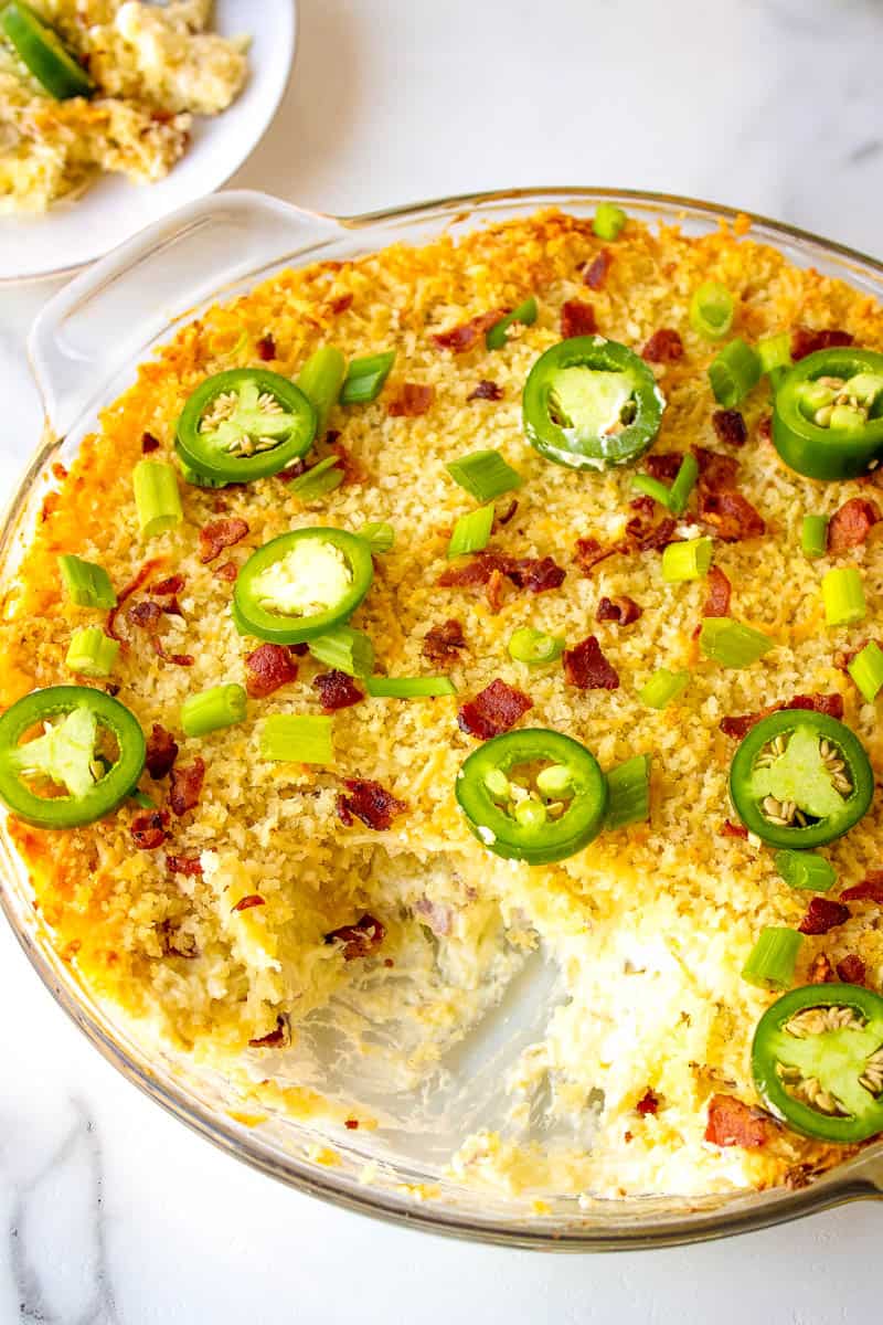 jalapeno popper dip in a dish on the table
