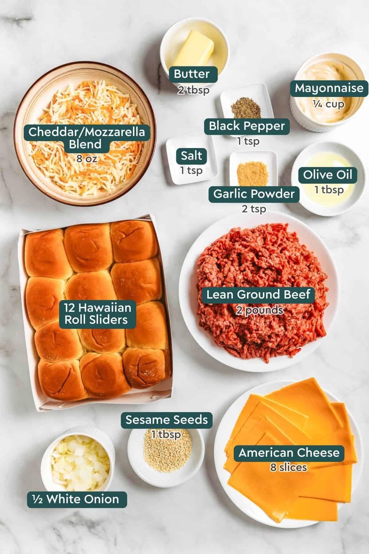 Ingredients for baked cheeseburger sliders, including cheese, butter, mayo, oil, seasonings, rolls, ground beef, sesame seeds, and onion.
