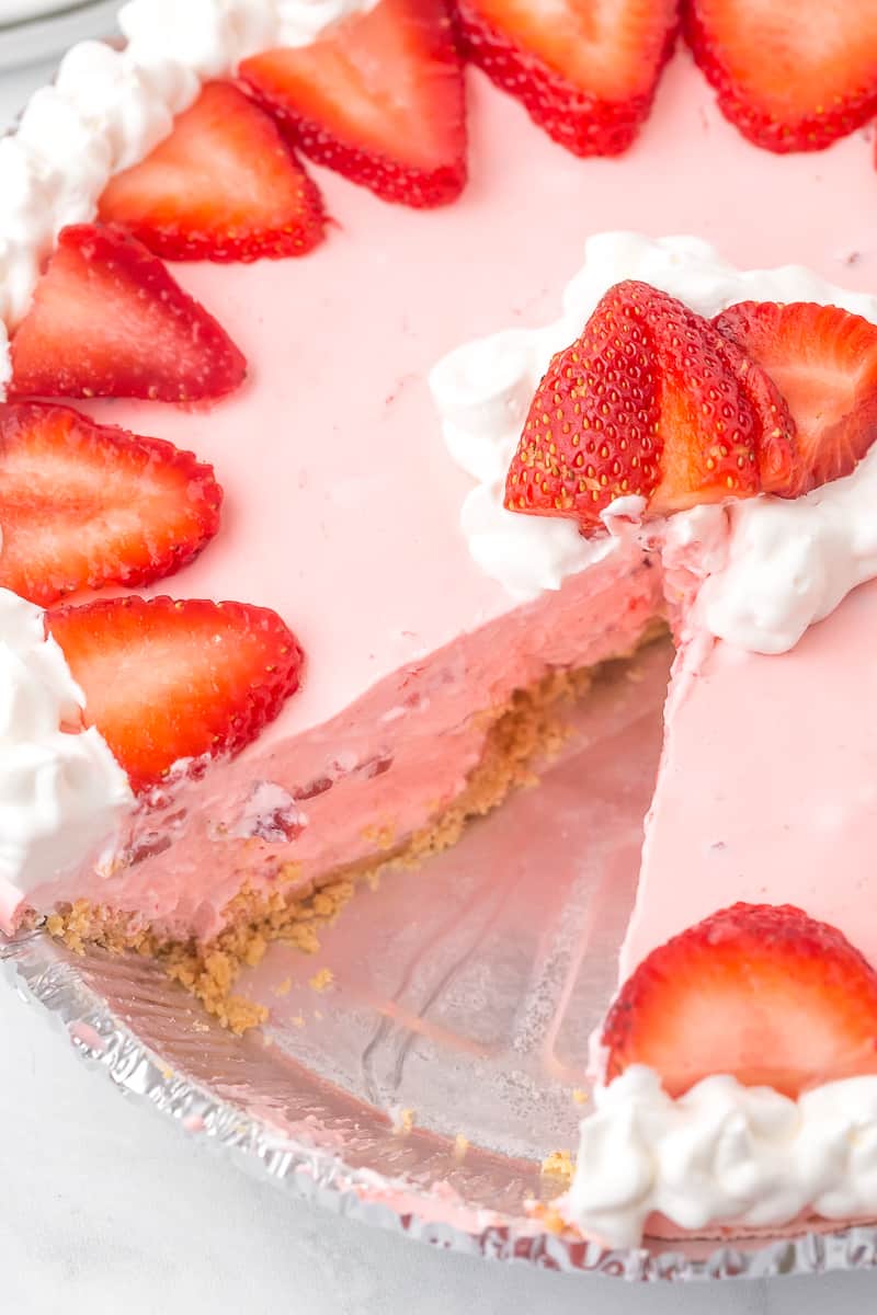 no bake strawberry jello pie with a slice taken out