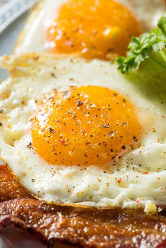 Homemade Sunnyside Eggs Breakfast with Toast and Bacon