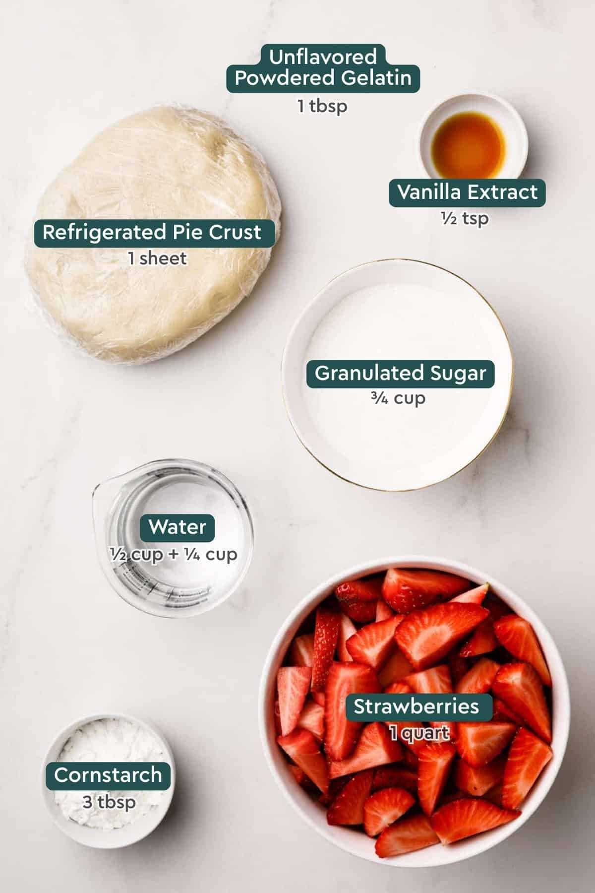Ingredients for no bake strawberry pie, including gelatin, vanilla, pie crust, sugar, water, strawberries, and cornstarch.