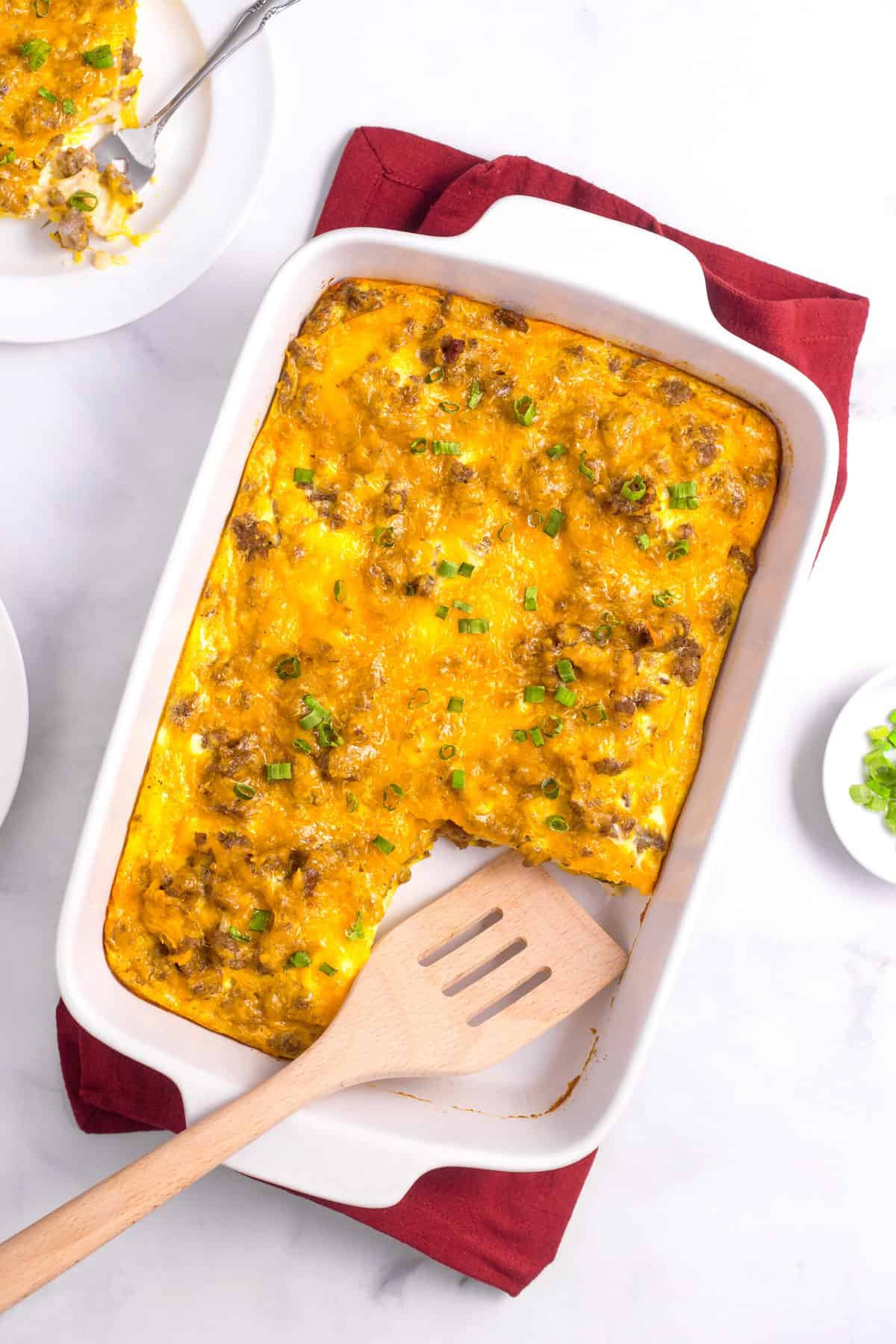 breakfast casserole with biscuits baked in a casserole dish