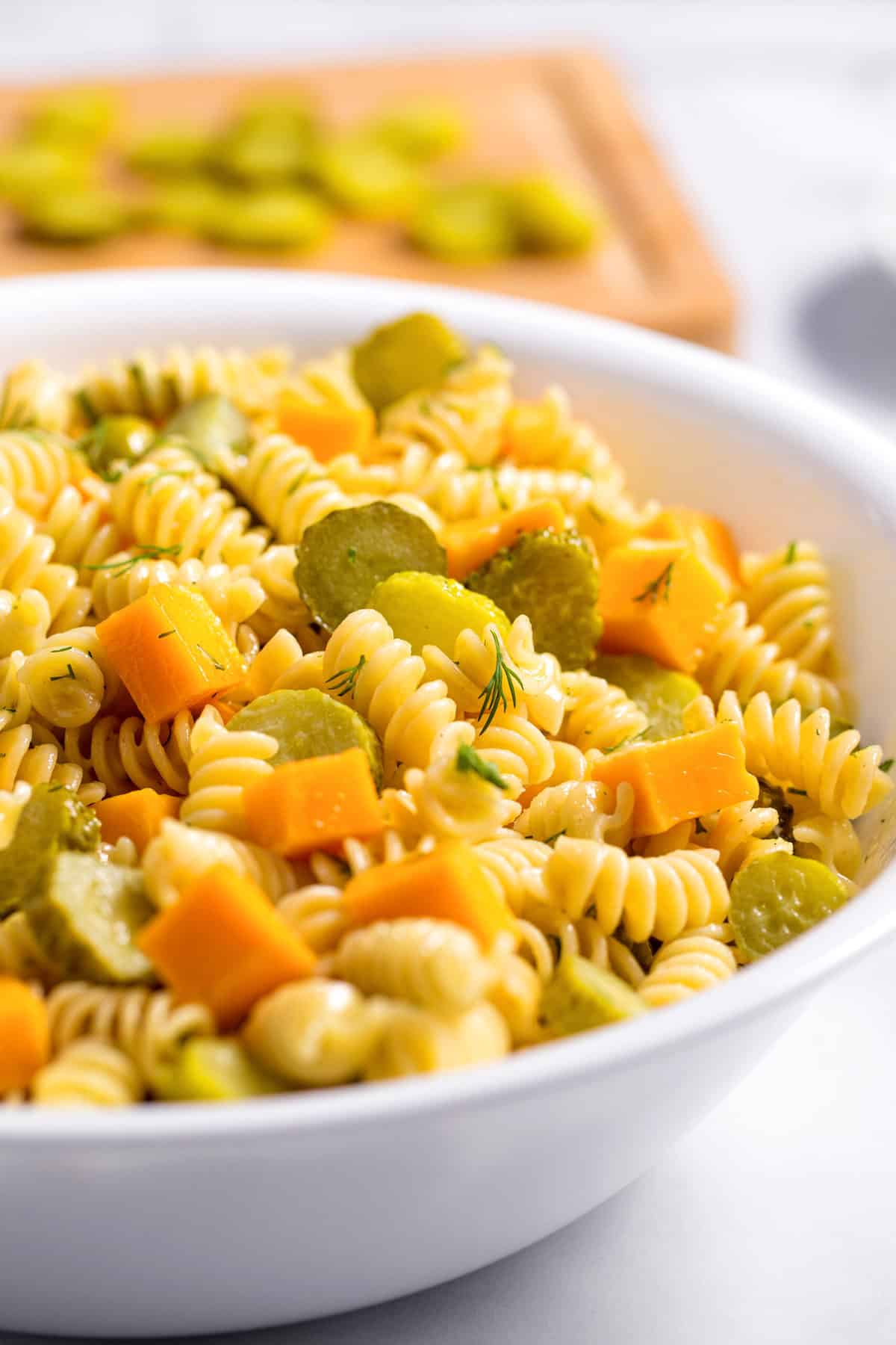 close up of a bowl of dill pickle pasta salad