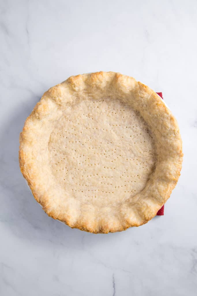 Pie crust docked with fork.