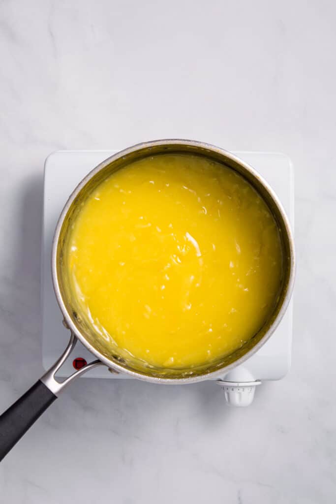 Lemon curd filling for pie in saucepan.