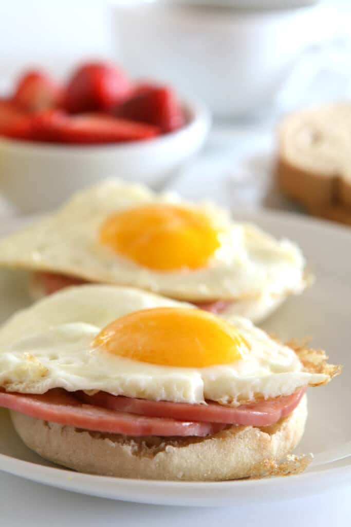 over easy eggs on an english muffin