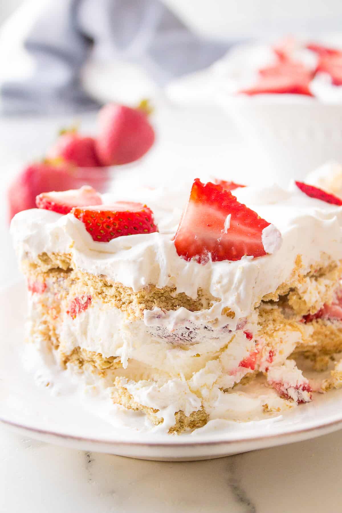 close up image of strawberry icebox cake served on a plate
