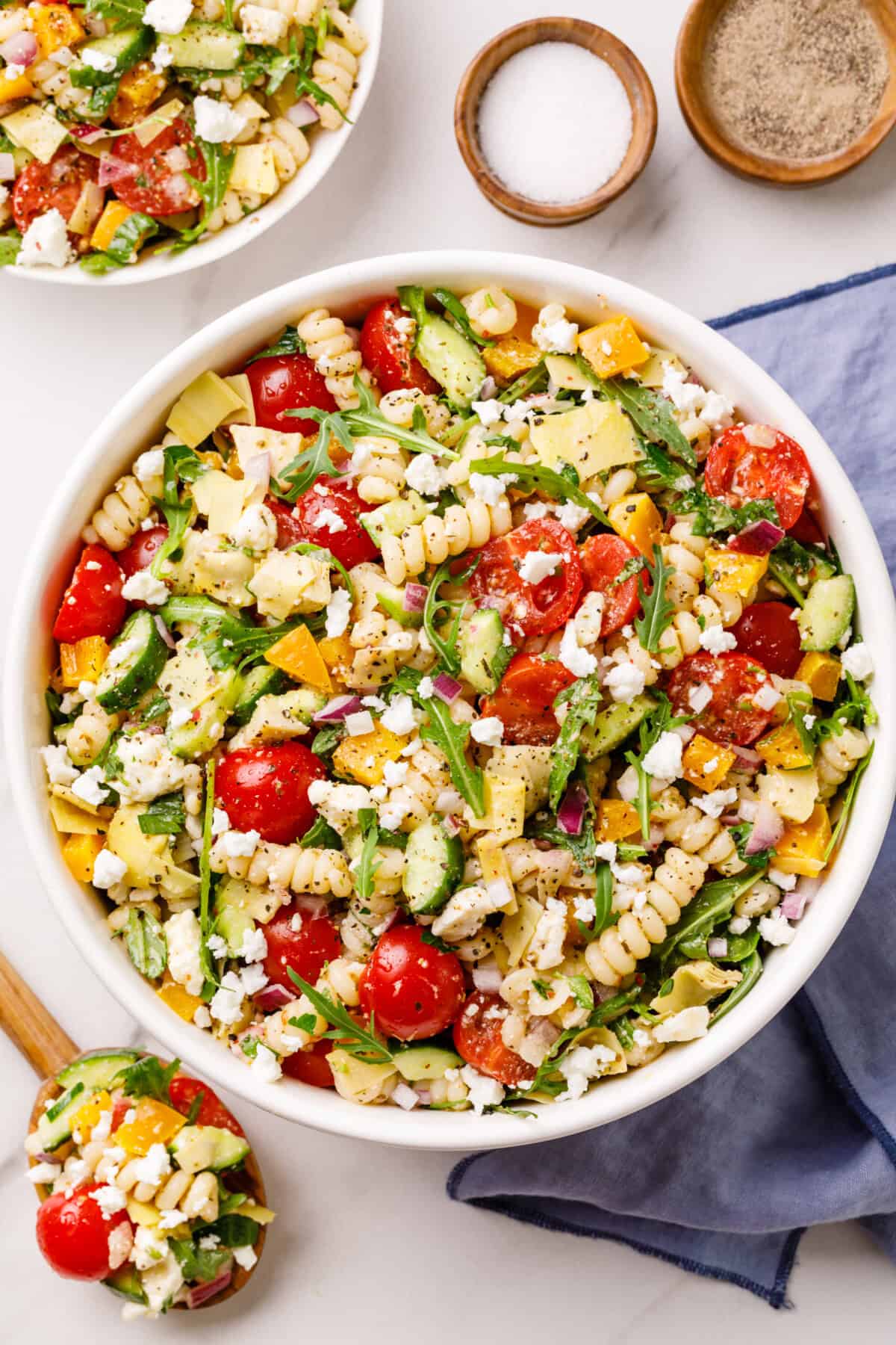 vegetables and pasta in a white bowl