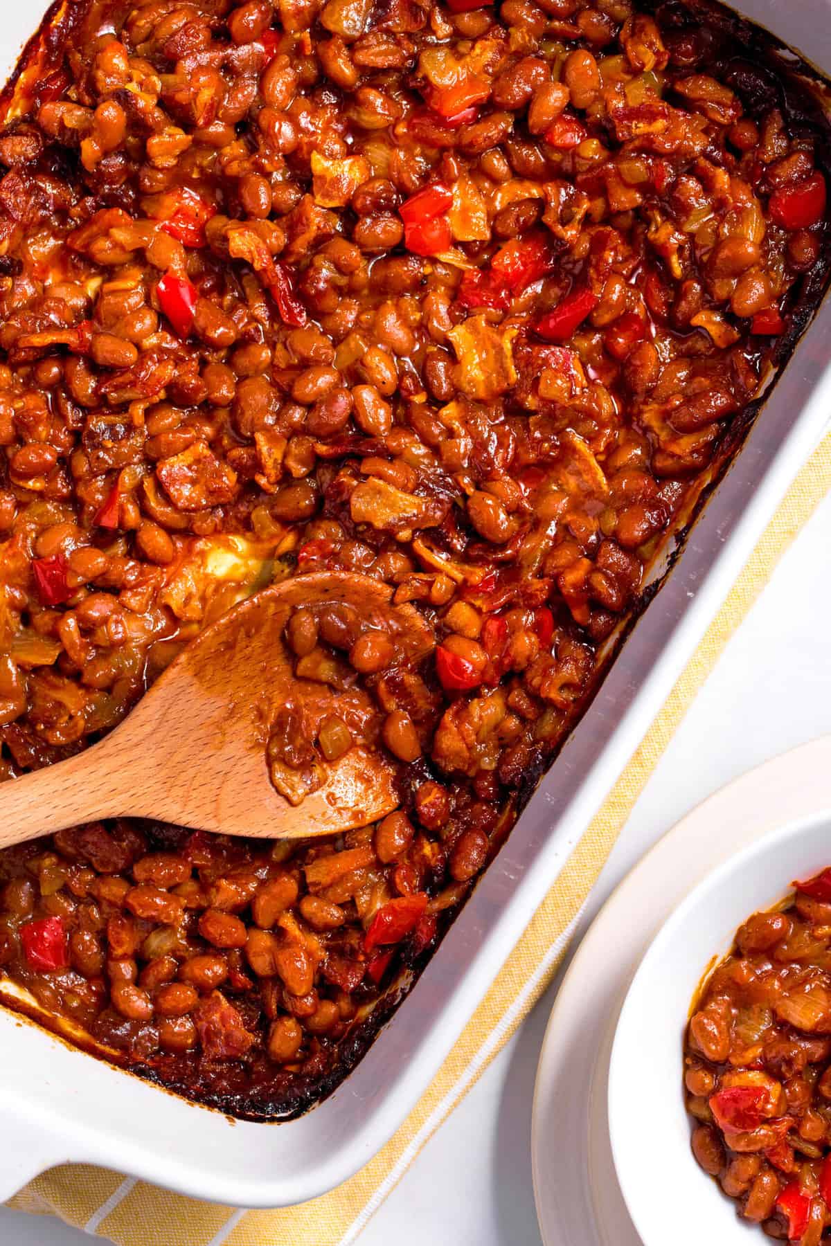 top down image of baked beans in a casserole dish