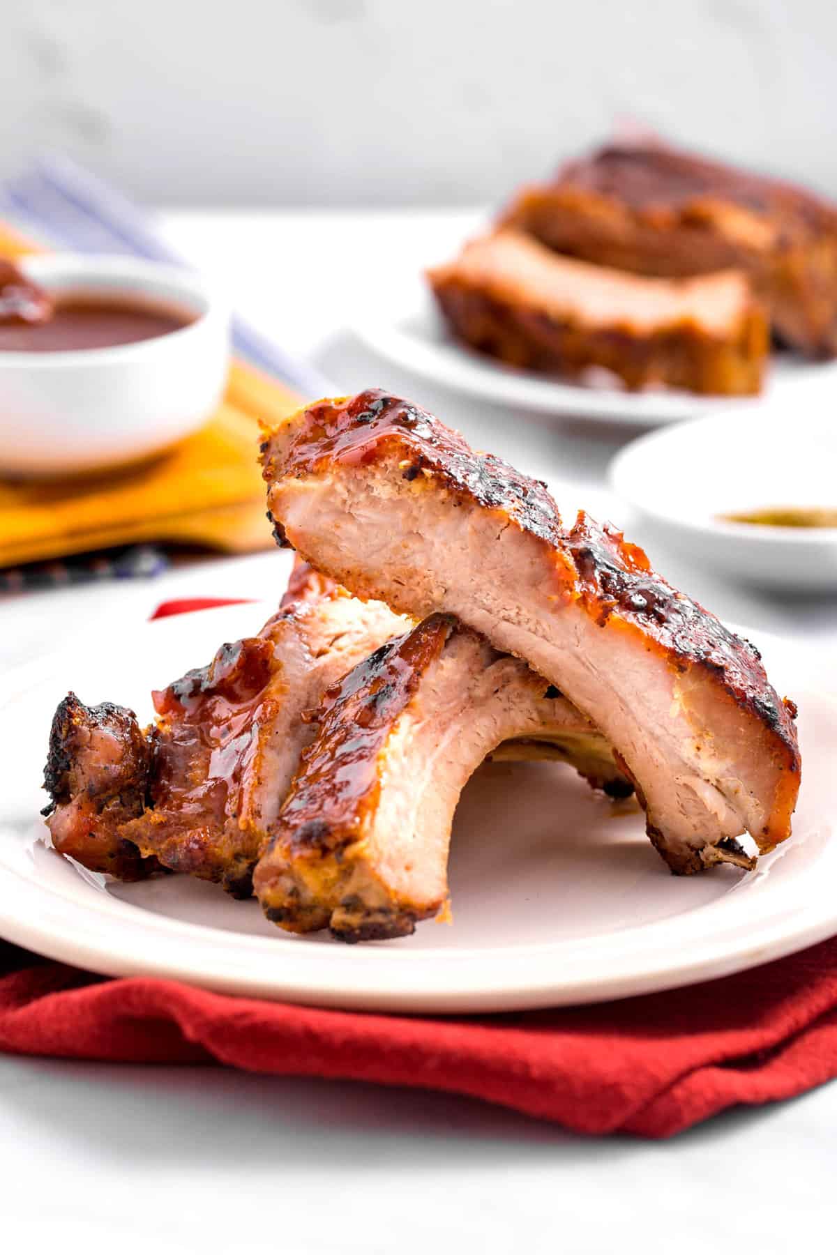 BBQ pork ribs on white plate.