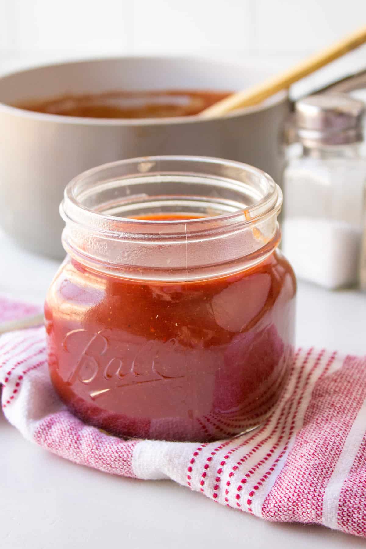 homemade bbq sauce stored in a mason glass jar