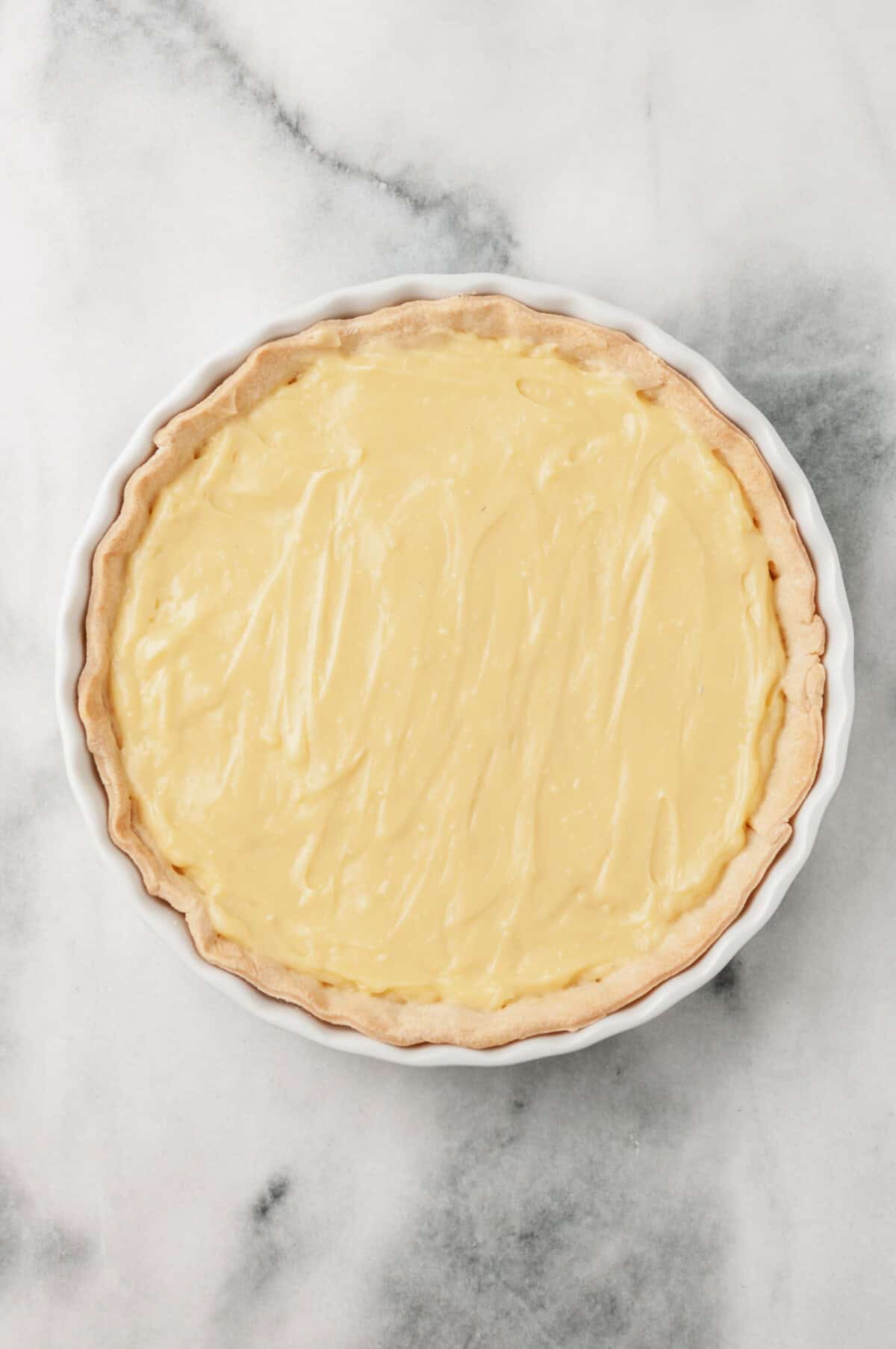 Pie crust filled with pastry cream.