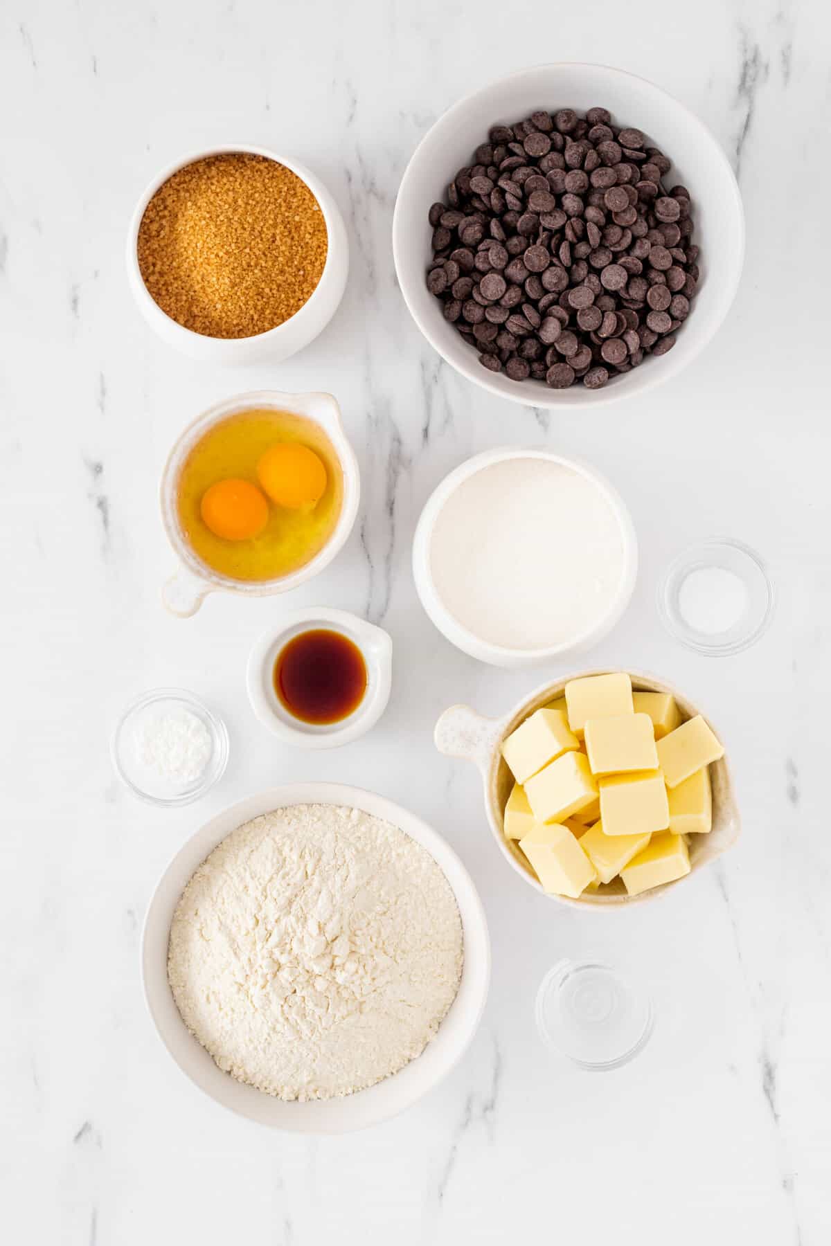 Overhead view of ingredients to make crispy and chewy chocolate chip cookies.