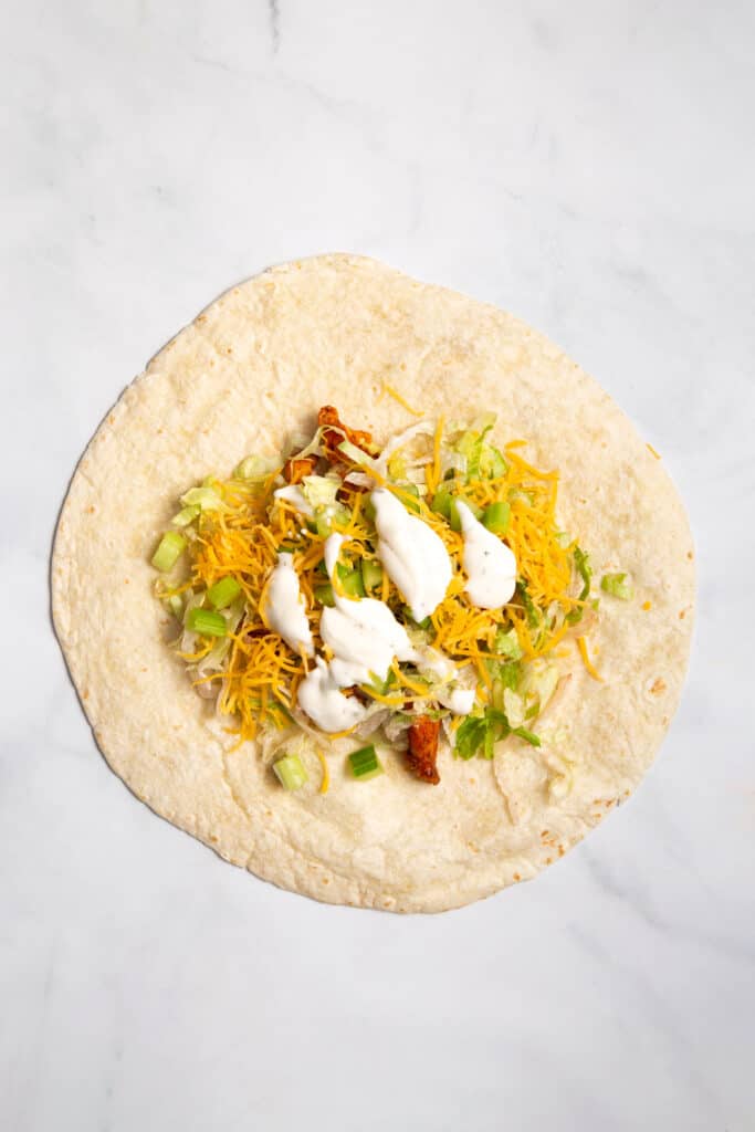 Buffalo chicken wrap before folding.