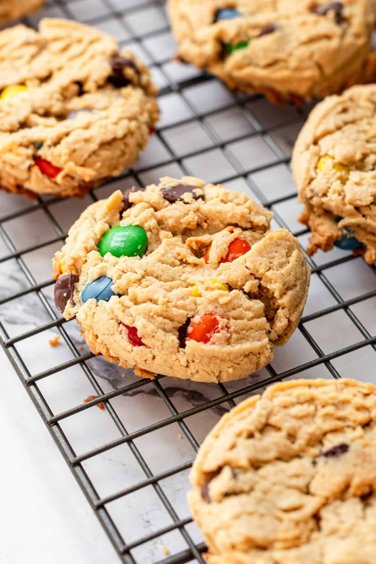 Monster cookies on a baking sheet.