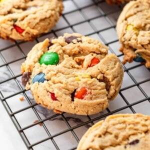 Monster cookies on a baking sheet.