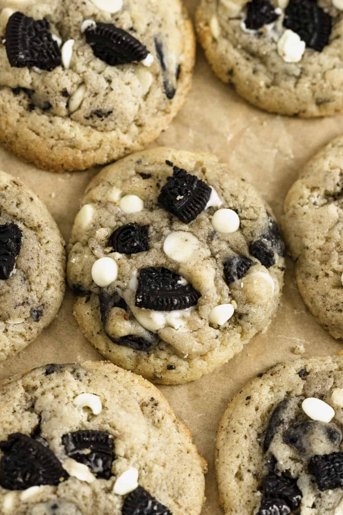 Top down image of cookies and cream cookies on parchment paper.
